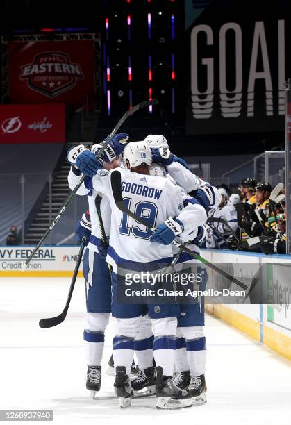 Yanni Gourde of the Tampa Bay Lightning celebrates his goal against the Boston Bruins with teammates during the first period of Game Three of the...