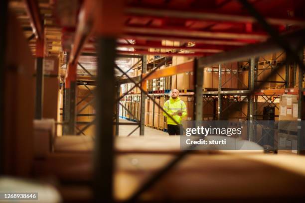 storage warehouse stockcheck - big beard stock pictures, royalty-free photos & images