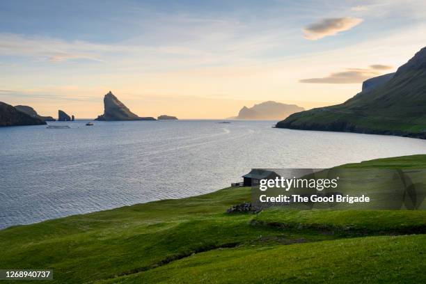 bøur, faroe islands - rock formation isolated stock pictures, royalty-free photos & images