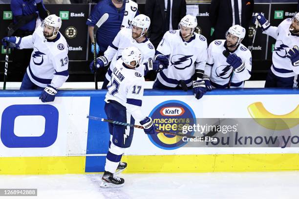 Alex Killorn of the Tampa Bay Lightning is congratulated by his teammates after scoring a goal against the Boston Bruins during the second period in...