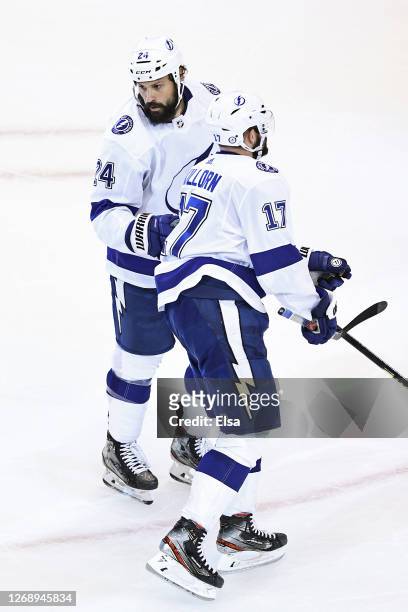 Alex Killorn of the Tampa Bay Lightning celebrates with Zach Bogosian after scoring a goal against the Boston Bruins during the second period in Game...