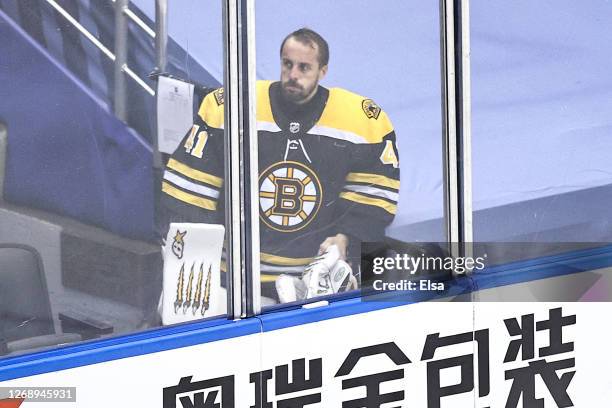 Jaroslav Halak of the Boston Bruins looks on from the bench after being taken out of the game against the Tampa Bay Lightning during the second...