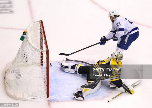 Brayden Point of the Tampa Bay Lightning scores a breakaway goal past Dan Vladar of the Boston Bruins during the second period in Game Three of the...