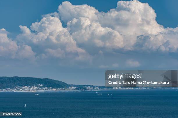 cumulus clouds on the beach in kanagawa prefecture of japan - sea ​​of ​​clouds stock pictures, royalty-free photos & images