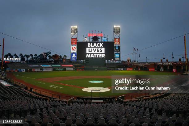 The words 'Black Lives Matter' are displayed on the digital screen after the postponement of the game between the San Francisco Giants and the Los...