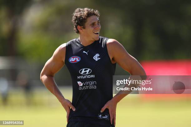 Charlie Curnow of the Blues looks on during a Carlton Blues AFL training session at Metricon Stadium No.2 on August 27, 2020 in Gold Coast, Australia.