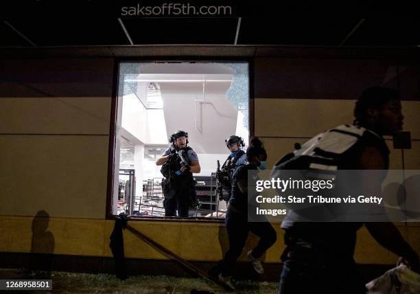 Police cleared out and secured Saks OFF 5th in downtown Minneapolis.