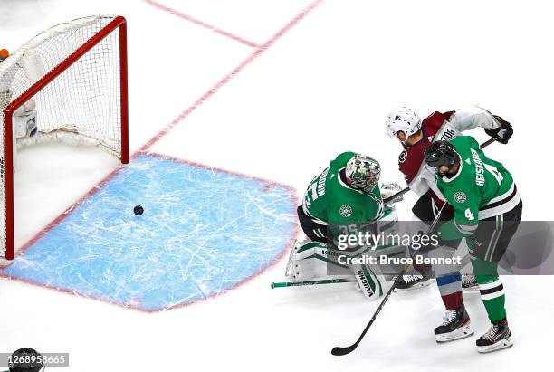 Gabriel Landeskog of the Colorado Avalanche scores a goal past Anton Khudobin of the Dallas Stars during the second period in Game Three of the...