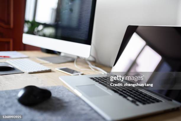 desktop essentials on wooden table - ipad white background stock pictures, royalty-free photos & images