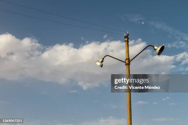 end of line (last streetlights) - street light post stock pictures, royalty-free photos & images