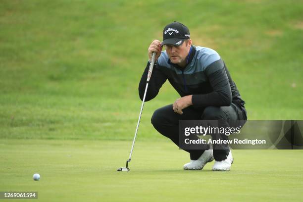 Marc Warren of Scotland lines up a putt on the 2nd green during Day 1 of the ISPS HANDA UK Championship at The Belfry on August 27, 2020 in Sutton...