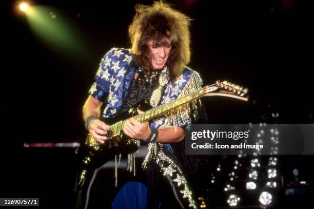 American rock guitarist best known as the lead guitarist for Bon Jovi, Richie Sambora performs during the Slippery When Wet Tour, on March 10 at Cobo...