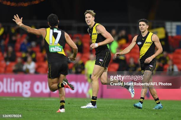 Tom J. Lynch of the Tigers celebrates kicking a goal during the round 14 AFL match between the Richmond Tigers and the West Coast Eagles at Metricon...