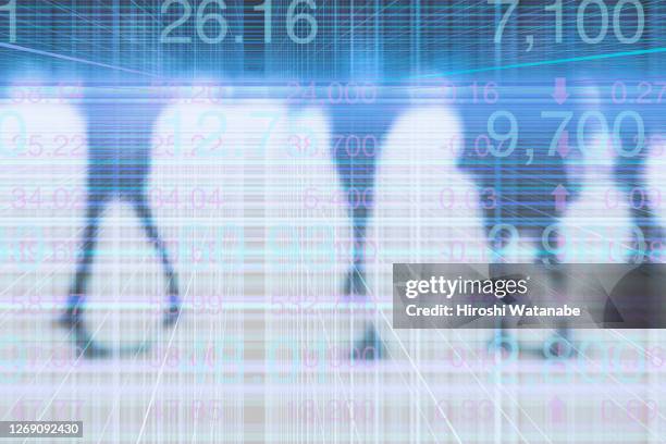 businessmen walking in cyberspace with stock charts - cyberspace grid stock pictures, royalty-free photos & images