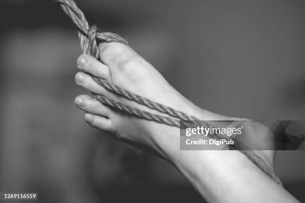 foot and jute rope - fetisj stock pictures, royalty-free photos & images