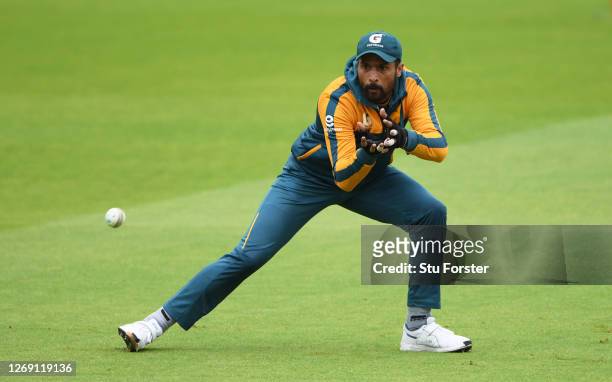 Mohammad Amir of Pakistan prepares to take a catch during fielding practice during a Pakistan Net Session at Emirates Old Trafford on August 27, 2020...