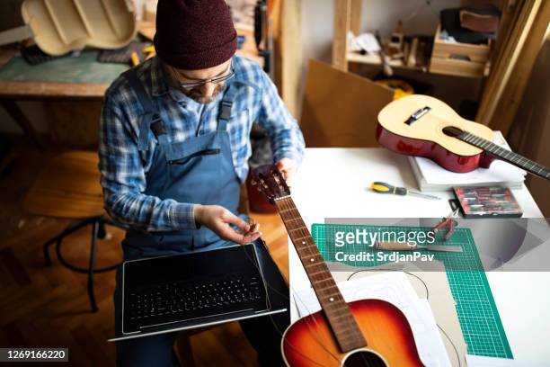 how to repair this? - guitar shop stock pictures, royalty-free photos & images