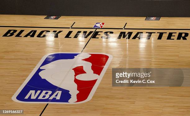 The Black Lives Matter logo is seen on an empty court as all NBA playoff games were postponed today during the 2020 NBA Playoffs at AdventHealth...