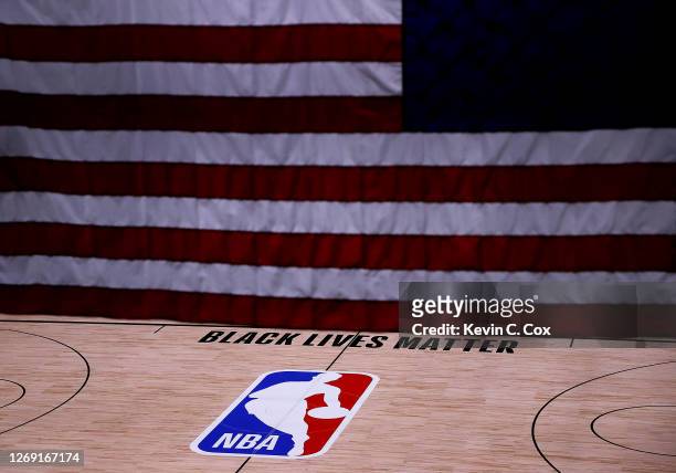 The Black Lives Matter logo is seen on an empty court as all NBA playoff games were postponed today during the 2020 NBA Playoffs at The Field House...