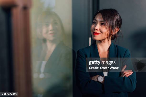 portrait of successful young asian businesswoman - anticipation business stock pictures, royalty-free photos & images