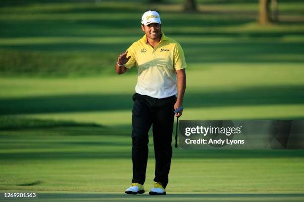 Hideki Matsuyama of Japan reacts to making a long putt on the ninth green during the first round of the BMW Championship on the North Course at...