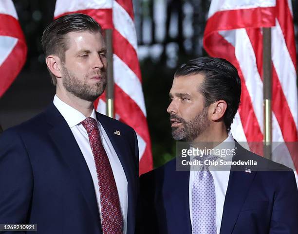 Donald Trump Jr. And Eric Trump look on as U.S. President Donald Trump prepares to deliver his acceptance speech for the Republican presidential...