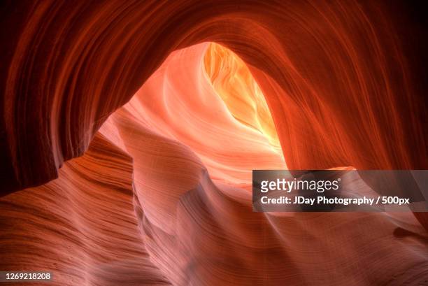 low angle view of rock formation, page, united states - red sand stock pictures, royalty-free photos & images