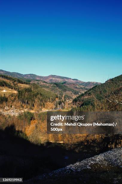 scenic view of landscape against clear blue sky, shipka, bulgaria - shipka stock pictures, royalty-free photos & images