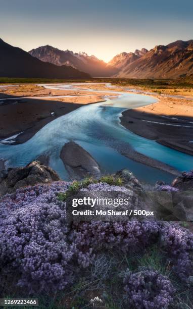 scenic view of lake by mountains against sky during sunset, el calafate, argentina - エルカラファテ ストックフォトと画像