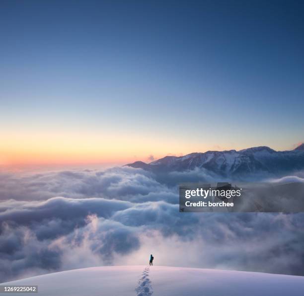 above the fog - aerial walking stock pictures, royalty-free photos & images