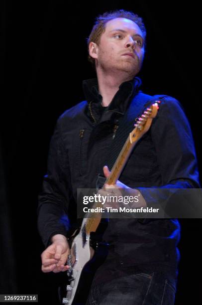Jonny Buckland of Coldplay performs during Coachella 2005 at the Empire Polo Fields on April 30, 2005 in Indio, California.