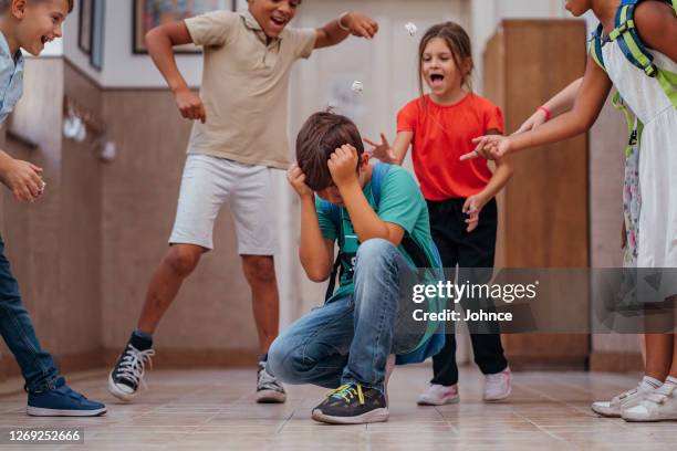 peer violence in the school - abuse stock pictures, royalty-free photos & images