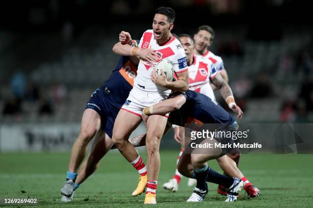 Corey Norman of the Dragons charges forward during the round 16 NRL match between the St George Illawarra Dragons and the Gold Coast Titans at...