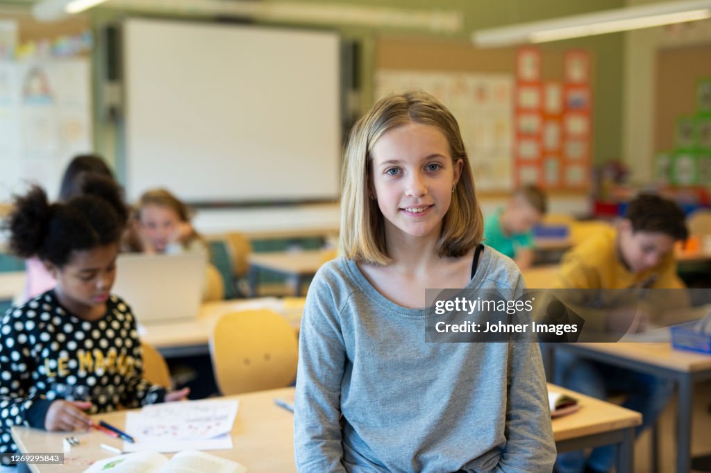 Girl In Classroom High-Res Stock Photo - Getty Images
