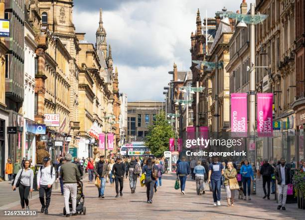 people on buchanan street in glasgow - glasgow people stock pictures, royalty-free photos & images
