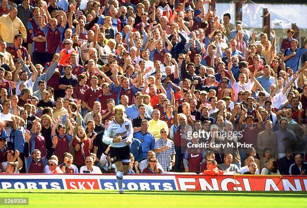 David Beckham of Manchester United faces the hostile West Ham crowd in the FA Carling Premiership game at Upton Park, London, England. The game ended...