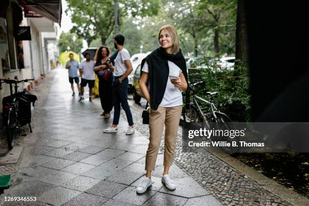 people queuing for restaurant while social distancing - social distancing restaurant stock pictures, royalty-free photos & images