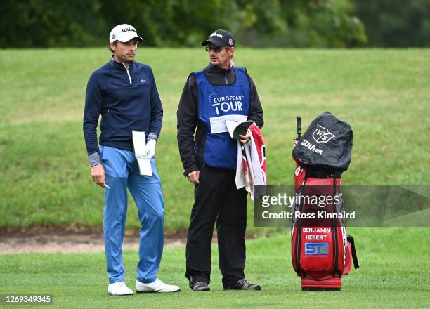 Benjamin Hebert of France with his caddie on the 17th hole during Day two of the UK Championship at The Belfry on August 28, 2020 in Sutton...