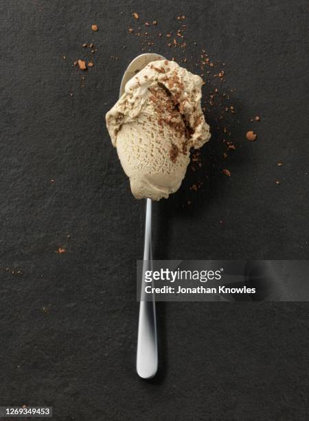 ice cream on spoon - ice cream sprinkles stock pictures, royalty-free photos & images
