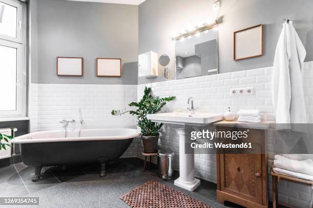 clean interior of modern apartment bathroom - domestic bathroom stock pictures, royalty-free photos & images