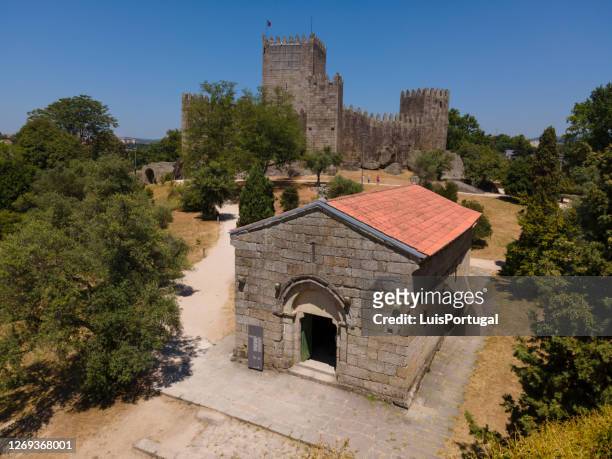 church of s.miguel do castelo e guimarães castl - guimarães stock pictures, royalty-free photos & images