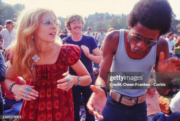 Couple dancing in a public park, 1969.