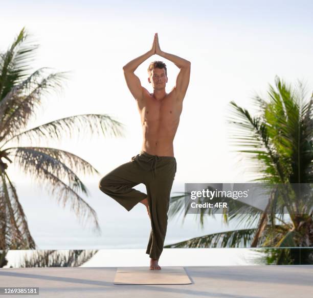 628 Men In Yoga Pants Stock Photos, High-Res Pictures, and Images ...