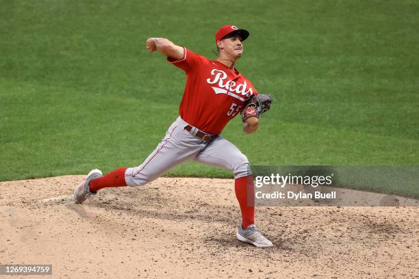 Robert Stephenson of the Cincinnati Reds pitches in the seventh inning against the Milwaukee Brewers during game one of a doubleheader at Miller Park...