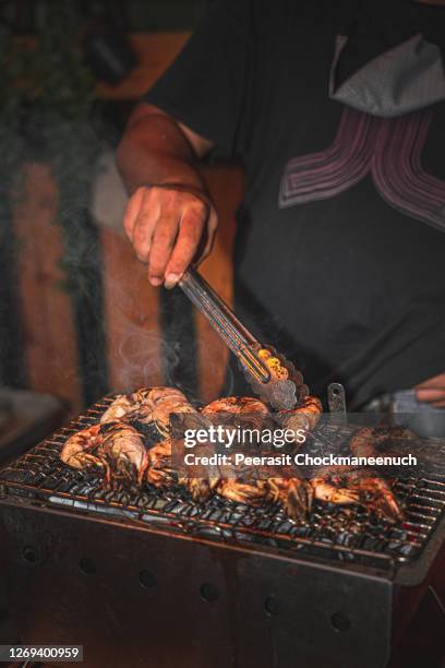 fresh grilled seafood - grilled squid stock-fotos und bilder