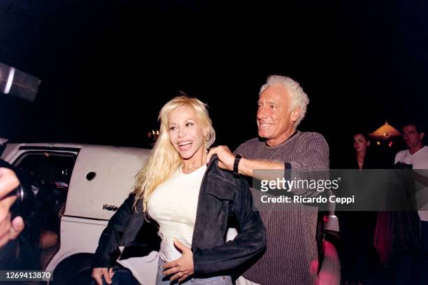 Guillermo Coppola agent of Diego Maradona arrives in a limousine with the celebrity Alejandra Pradon to a party at Conrad Hotel on January 08, 1999...