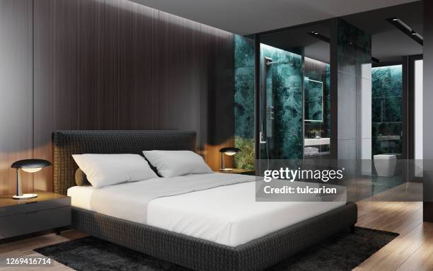 luxe appartement master slaapkamer interieur met badkamer met douche. grote groene marmeren tegels. geïnspireerd door high class hotelkamer. - hotelsuite stockfoto's en -beelden