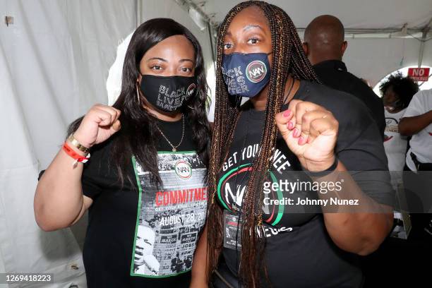 Ashley Sharpton and Dominique Sharpton-Bright pose backstage during the "Get Your Knee Off Our Necks" Commitment March on Washington at the Lincoln...