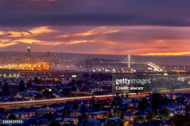 san francisco and oakland california with wildfire smoke - oakland california night stock pictures, royalty-free photos & images