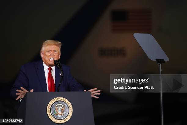 President Donald Trump speaks at an airport hanger at a rally a day after he formally accepted his party’s nomination at the Republican National...